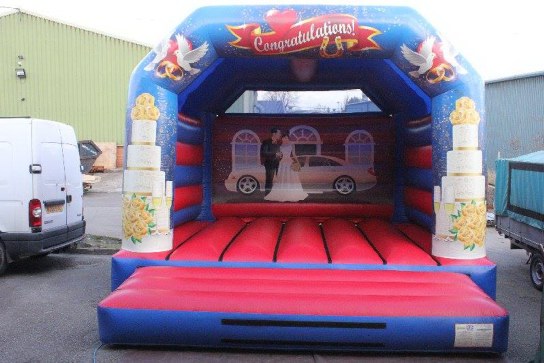 white wedding bouncy castle hire Dorset great at your wedding venue